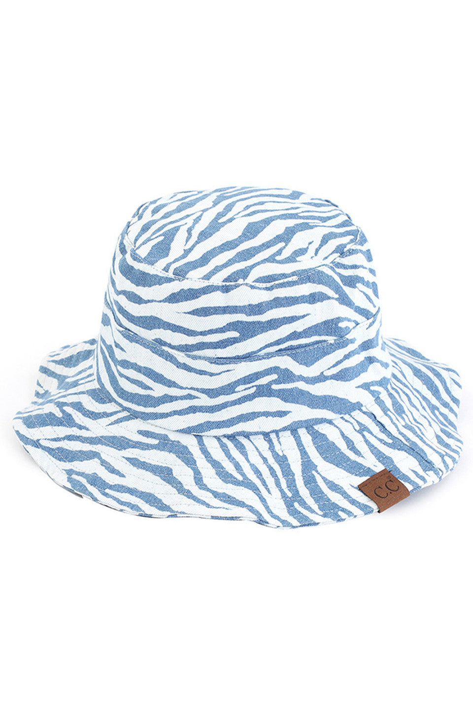 Denim C.C. ZEBRA PRINT BUCKET HAT is the perfect accessory for any outdoor adventure. Made from high-quality materials, it offers both style and functionality. Stay protected from the sun and make a statement with its bold zebra print design. Trust in C.C. for expertly crafted hats.