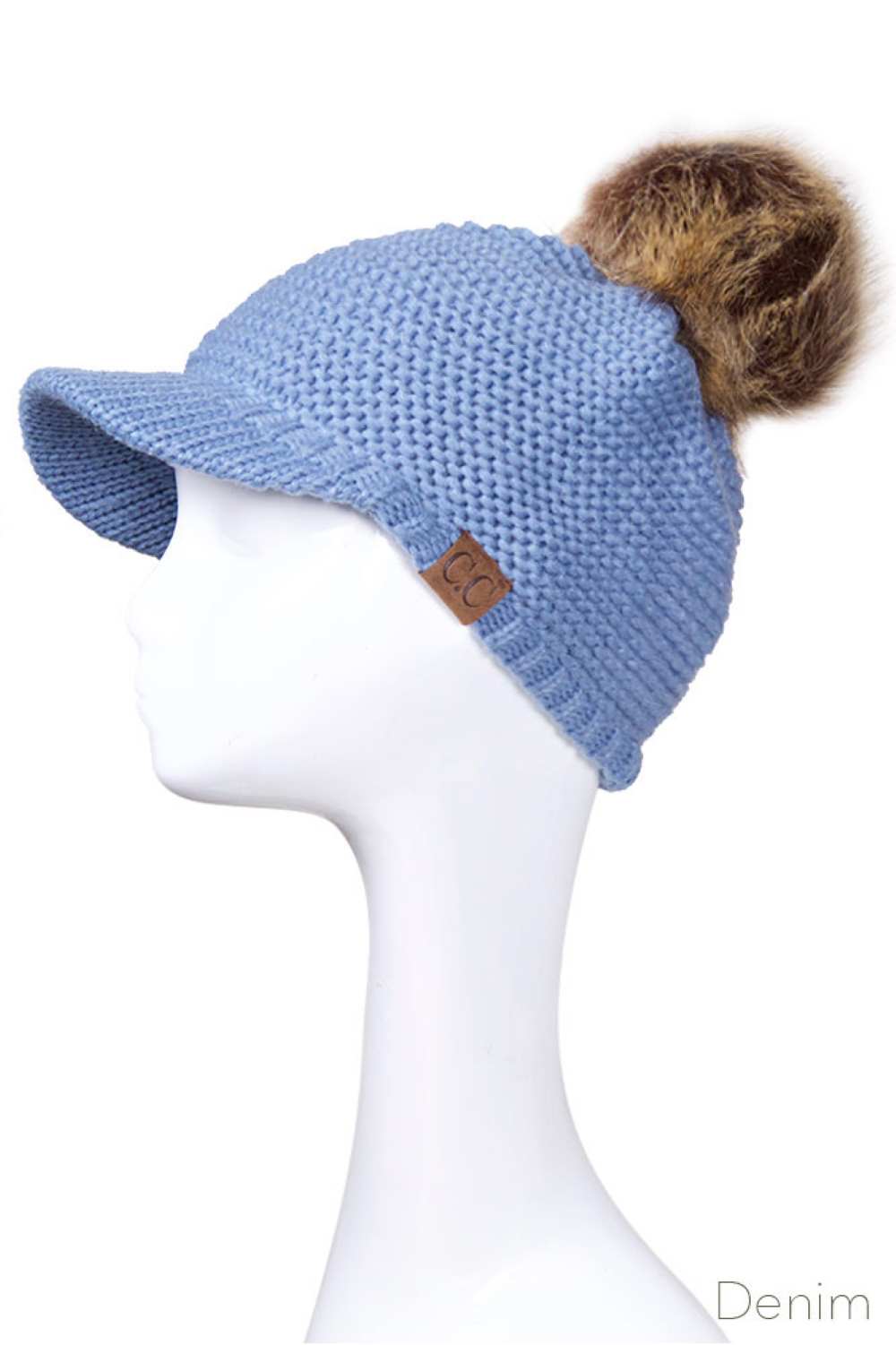 Denim Elevate your winter wardrobe with this versatile C.C knit brim beanie, crafted from 100% soft acrylic for exceptional comfort and durability. The signature knitted brim design pairs beautifully with a plush fur pom pom, adding a touch of sophistication to any cold-weather look. One size fits most, making it an effortless accessory choice for anyone seeking warmth without compromising on style. Perfect for layering or standalone wear, this beanie delivers both functionality and fashion