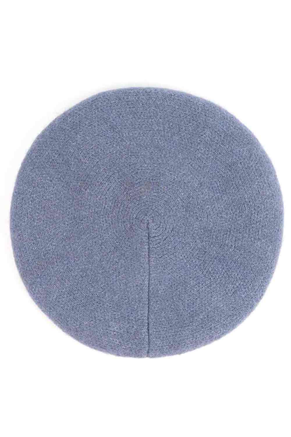 Denim The C.C Scalloped Texture Pattern Wool Beret Beanie features a distinctive scalloped texture that adds visual interest to your everyday look. Crafted from a comfortable blend of 60% acrylic, 22% recycled polyester, and 18% nylon, this beret offers a soft feel with excellent durability. The stretchy construction ensures a perfect fit for most head sizes while maintaining its shape throughout the day.
