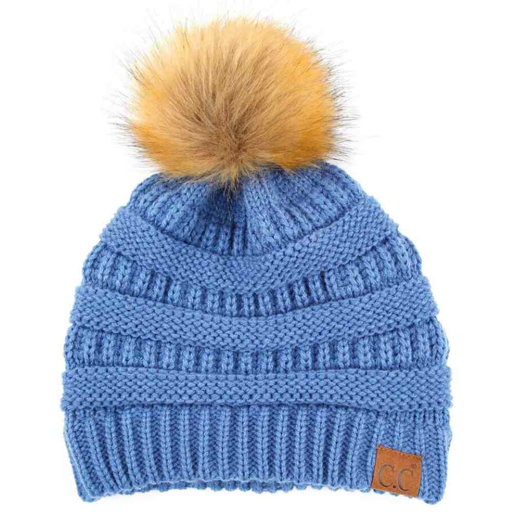 Denim Stay warm and cozy with this classic C.C Pom Pom Knit Beanie, crafted from 100% soft acrylic for all-day comfort. The ribbed knit design adds texture and durability, while the signature pom pom on top brings a playful touch to any winter outfit. One size fits most, making it the perfect accessory for everyone. Ideal for cold weather adventures or casual everyday wear.