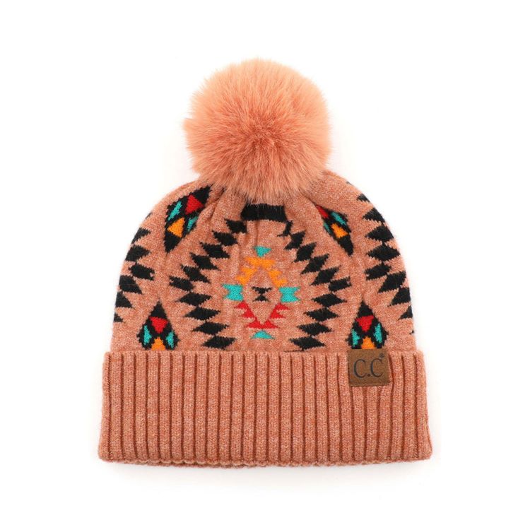 Desert Sand C.C Soft Aztec Pattern Beanie with Faux Fur Pom,&nbsp;is beautifully knitted with a variety of colors and design that brings a unique look. Coordinate these aztec pattern beannie with any outfit to match the best with absolute warmth and coziness in style. This is an ideal winter head cover that comes in one size winter cap with a faux fur pom that fits most head sizes. Perfect winter gift accessory for your friends, family, and the persons you love.