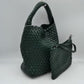 Dust Green This stylish everyday hobo bag features an all-over classic basket weave design and a slouchy silhouette. It is crafted with a seamless, integrated wide top handle that transitions directly into the main storage compartment for comfortable hand or shoulder carrying.