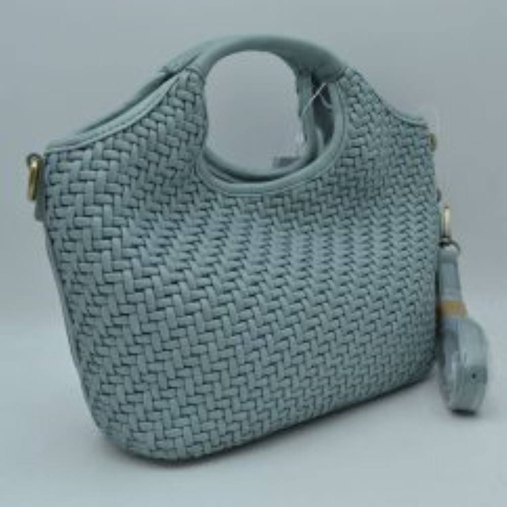 Dusty Blue Elevate your everyday style with this versatile woven handbag, designed to seamlessly transition from mornings on the go to casual evenings out. Featuring a unique basket-weave texture that adds a touch of sophisticated craftsmanship, this bag balances a modern silhouette with timeless appeal. It is crafted with integrated, cut-out top handles for a sleek look, and it includes a detachable, adjustable shoulder strap that allows you to effortlessly switch between a classic handbag, a relaxed shoul