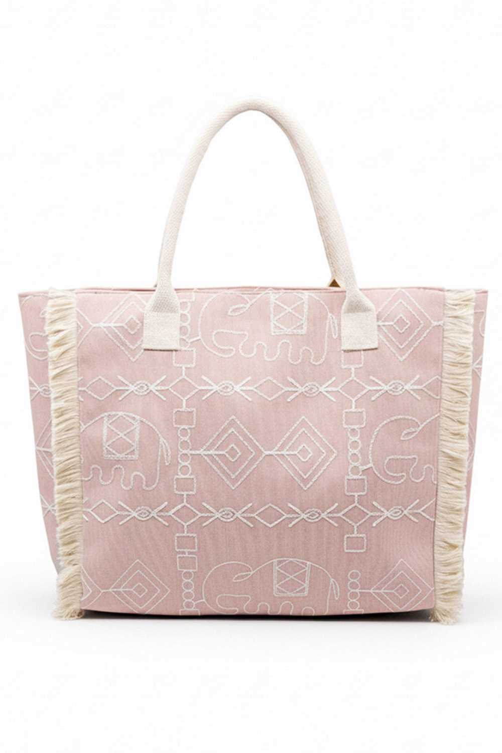 Dusty Pink Carry your essentials in bohemian style with this eye-catching tote bag. Featuring a vibrant geometric and elephant print design accented with playful fringe detailing, it's the perfect accessory for everyday adventures or weekend getaways. Crafted from durable 100% polyester, this spacious tote measures 21" x 14.25" x 5" and includes a secure zipper closure to keep your belongings safe. An inner pocket provides convenient organization for smaller items. Whether you're heading to the market, beac