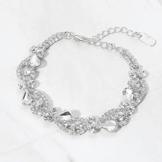 Madeline Love Clear, Silver Teardrop Stone Cluster Swirl Evening Bracelet
