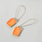 Madeline Love Coral, Neon Emerald Cut Stone Dangle Evening Earrings