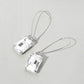 Madeline Love Clear, Light, Silver Emerald Cut Stone Dangle Evening Earrings