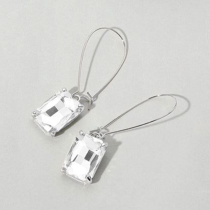 Madeline Love Clear, Light, Silver Emerald Cut Stone Dangle Evening Earrings
