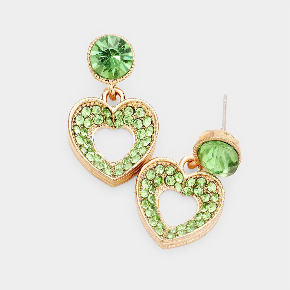 Rhinestone Pave Heart Cut out Earrings are the perfect blend of elegance and sparkle. With a stunning heart cut out design encrusted with shimmering rhinestones, these earrings are sure to elevate any outfit. Let these earrings add a touch of glamour to your wardrobe. 