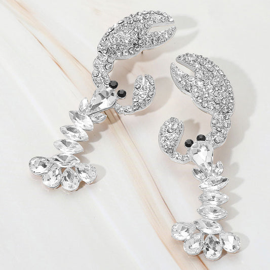 Madeline Love Clear, Rhodium Multi Stone Lobster Dangle Statement Earrings