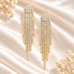 Madeline Love Clear, Gold Rhinestone fringe earrings