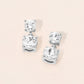 Madeline Love Clear, Rhodium Double Round Stone Drop Earrings