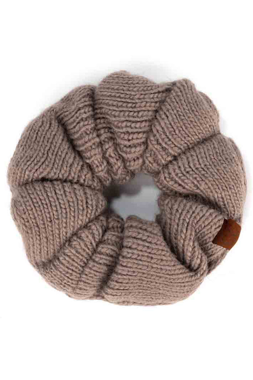 Earth Grey  C.C. Soft Knit Scrunchies provide a stylish and comfortable way to keep your hair in place without causing damage. Made with soft knit material, they are gentle on your hair and perfect for everyday wear. Their scrunchy design also adds a trendy touch to your hairstyle