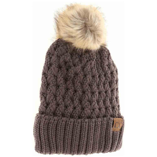 Earth-Grey- Solid Lattice Stitch Fur Pom CC Beanie features a meticulously crafted lattice stitch design that ensures exceptional warmth and durability. Topped with a soft, luxurious fur pom, this beanie combines functional insulation with sophisticated style. Its versatile solid color and expert construction make it an essential accessory for cold-weather protection while elevating your winter wardrobe.