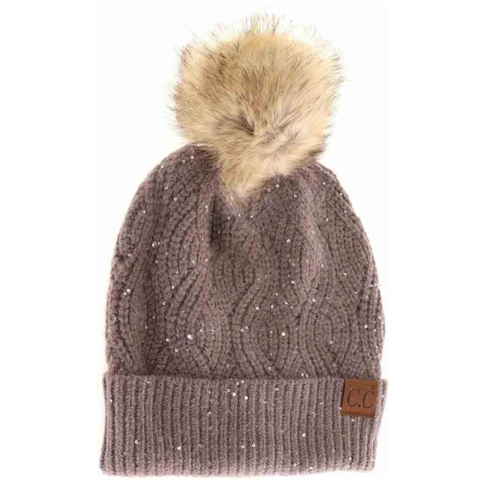 EarthGrey Sequin Brioche Cable Knit Fur Pom C.C Beanie combines classic craftsmanship with a modern touch. Featuring a soft brioche cable knit pattern enhanced by subtle sequins, this beanie adds understated sparkle to cold-weather style. The plush fur pom enhances warmth and a refined aesthetic, making it an ideal accessory for both functionality and fashion during chilly days. Durable and comfortable, it delivers expert-level design that complements any winter wardrobe. 