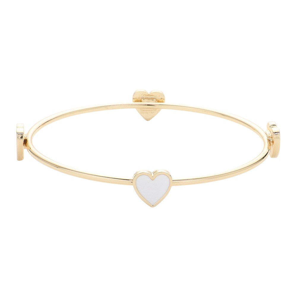 Enamel Heart Pointed Bangle Bracelet features a sleek and modern design that adds a touch of elegance to any outfit. Crafted from high-quality materials, it is durable and long-lasting. Its unique heart shape makes it a perfect gift for that special someone or a meaningful addition to your jewelry collection.