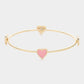 Enamel Heart Pointed Bangle Bracelet features a sleek and modern design that adds a touch of elegance to any outfit. Crafted from high-quality materials, it is durable and long-lasting. Its unique heart shape makes it a perfect gift for that special someone or a meaningful addition to your jewelry collection.