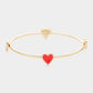 Enamel Heart Pointed Bangle Bracelet features a sleek and modern design that adds a touch of elegance to any outfit. Crafted from high-quality materials, it is durable and long-lasting. Its unique heart shape makes it a perfect gift for that special someone or a meaningful addition to your jewelry collection.
