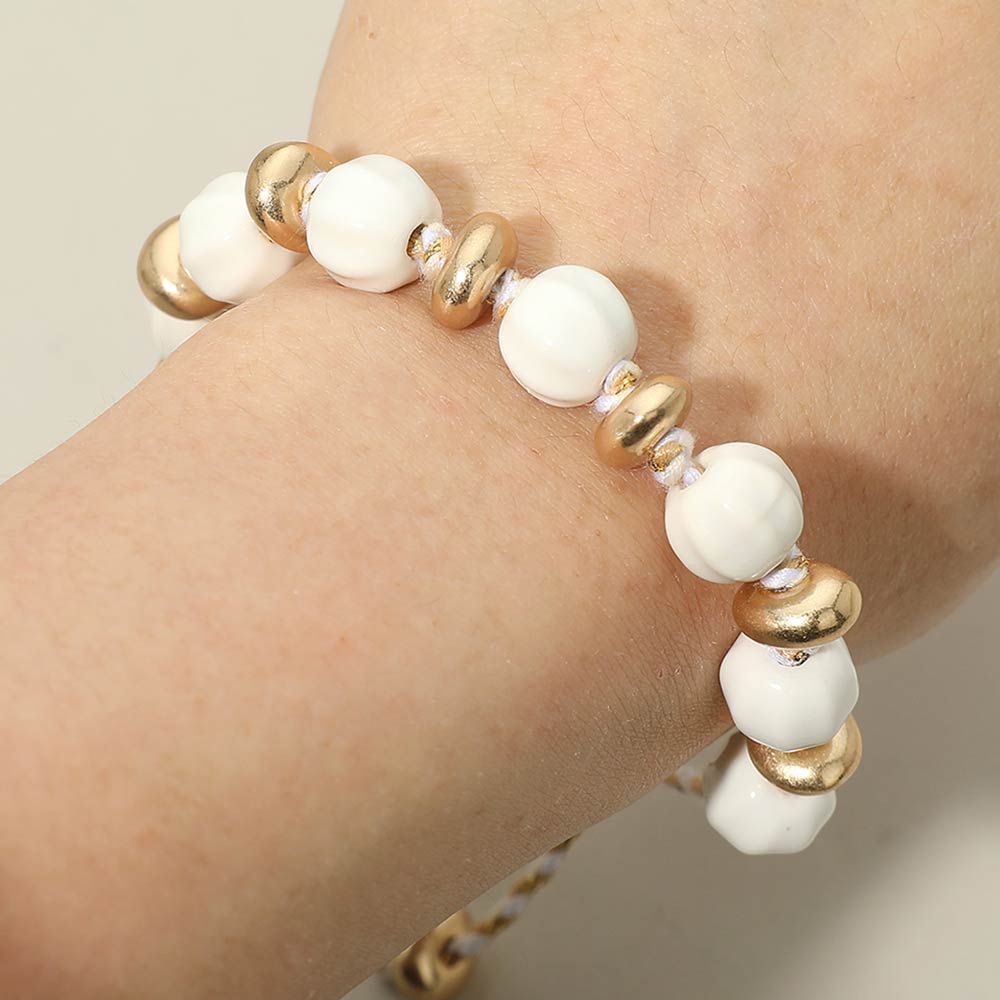 Madeline Love White, Worn Gold