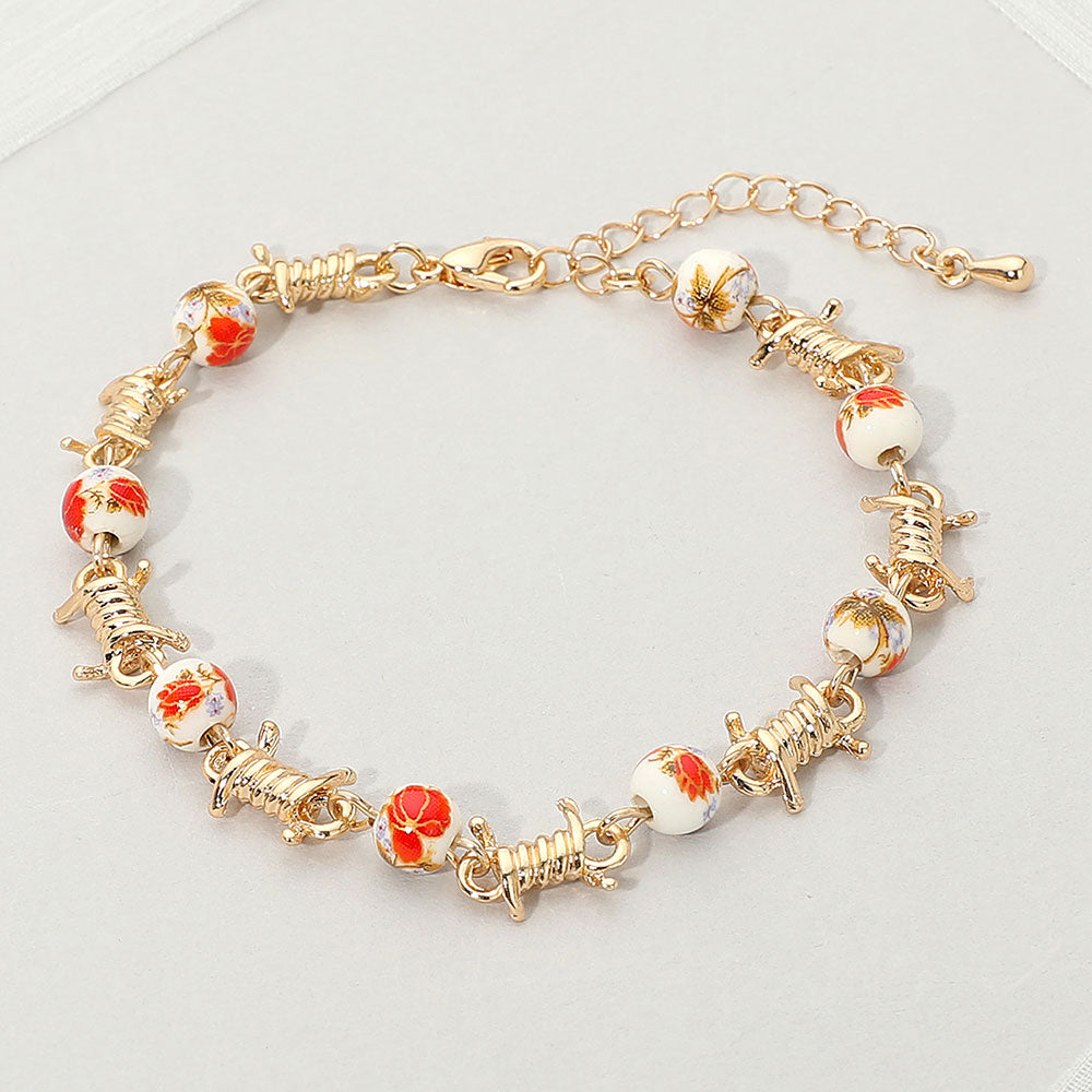 Madeline Love Gold, Red Floral Ceramic Ball Metal Rope Wrap Link Bracelet - Bracelets