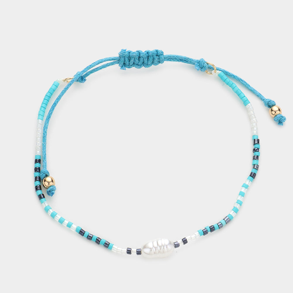 Madeline Love Light Blue Pearl Accented Beaded Cinch Pull Tie Bracelet - Bracelets