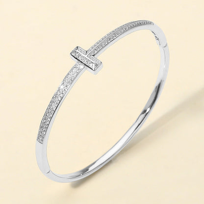 Madeline Love Rhodium Silver Plated CZ Stone Paved T-bar Hinged Bangle Bracelet - Bracelets