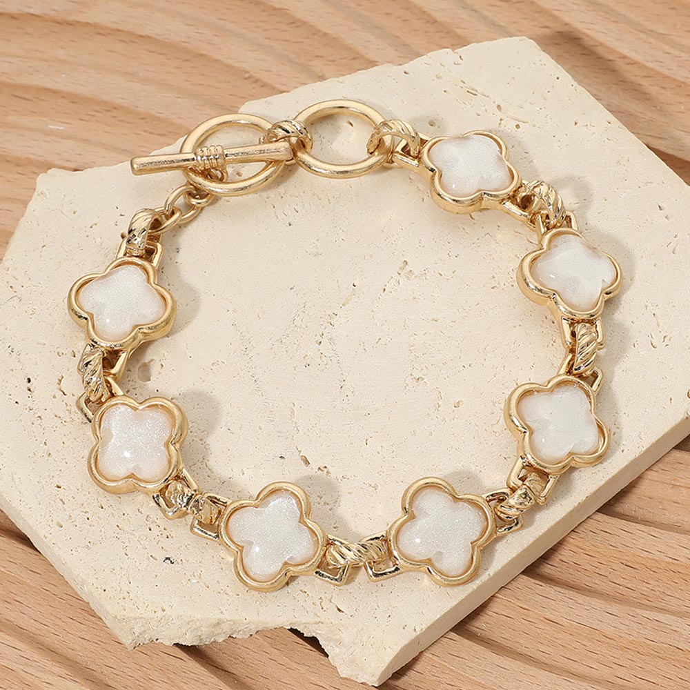 Madeline Love White, Worn Gold Bold Quatrefoil Stone Link Toggle Bracelet