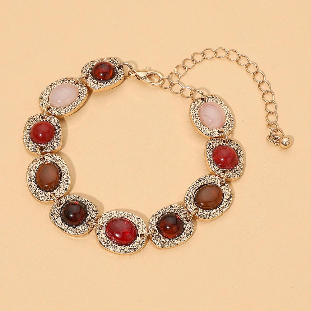 Madeline Love Antique Gold, Burgundy Abstract Oval Cabochon Link Bracelet