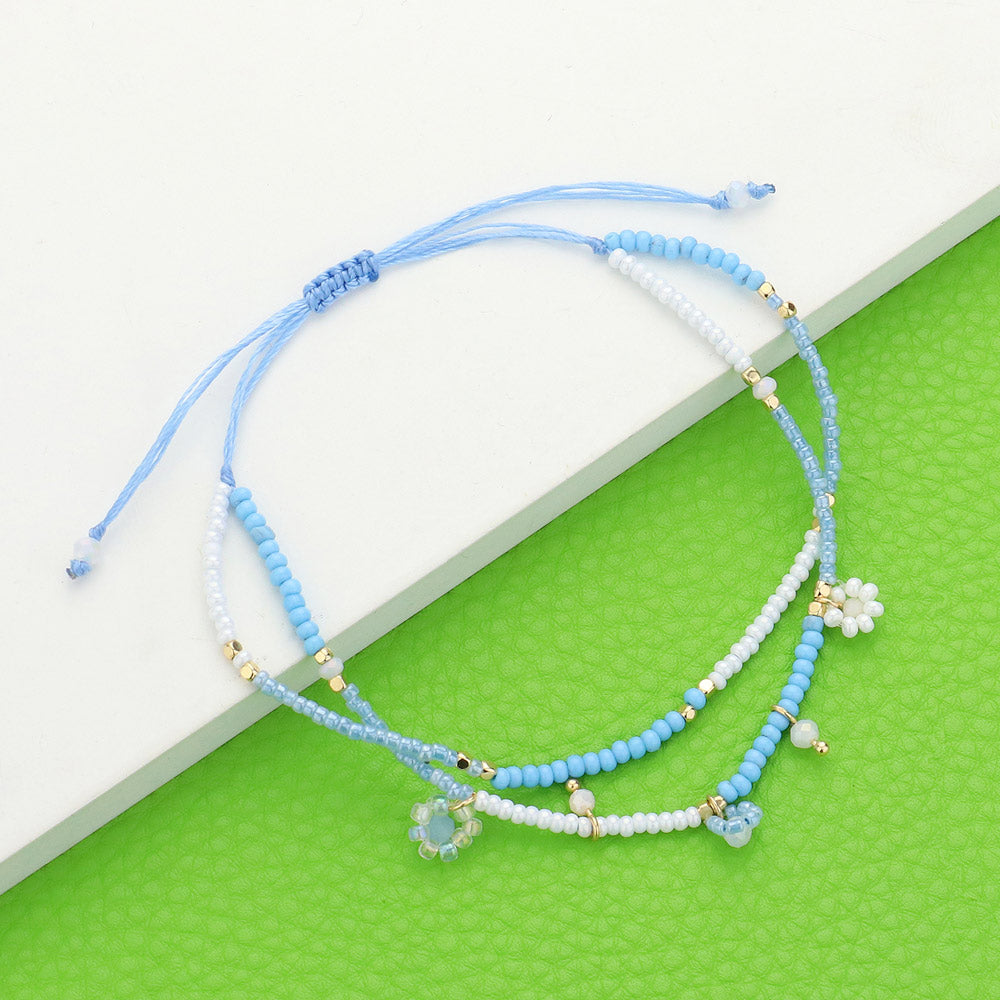 Madeline Love Gold, Light Blue Flower Beaded Cinch Pull Tie Bracelet - Bracelets