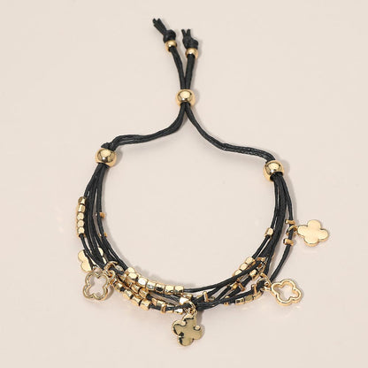 Madeline Love Black, Gold Quatrefoil Charm Beaded Multi Layered Cord Adjustable Cinch Pull Tie Bracelet - Bracelets