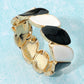 Madeline Love Black, White Enamel Marquise Link Hinged Bangle Bracelet - Bracelets
