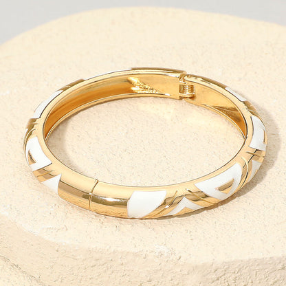 Madeline Love Gold, White Geometric Pattern Enamel Inlay Hinged Bangle Bracelet - Bracelets