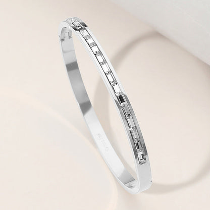 Madeline Love Clear, Silver Stainless Steel Baguette Stone Paved Hinged Bangle Bracelet - Bracelets