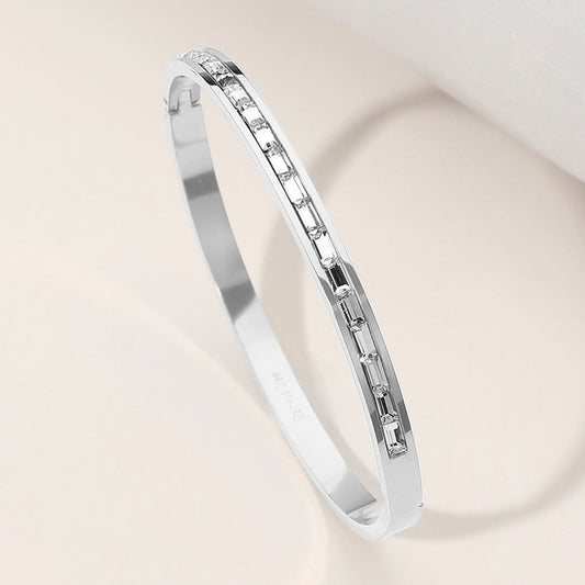 Madeline Love Clear, Silver Stainless Steel Baguette Stone Paved Hinged Bangle Bracelet - Bracelets