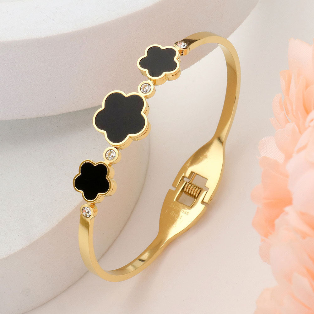 Madeline Love Black, Gold Stainless Steel Triple Quatrefoil Stone Bezel Pointed Hinged Bangel Bracelet - Bracelets