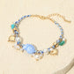 Madeline Love Blue, Gold Coastal Inspired Seashell Pearl Charm Embellished Braided Cord Bracelet - Earrings