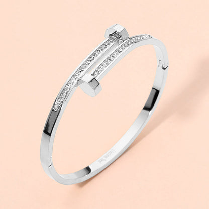 Madeline Love Silver Stainless Steel CZ Stone Paved Nail Head Tip Hinged Bangle Bracelet - Bracelets