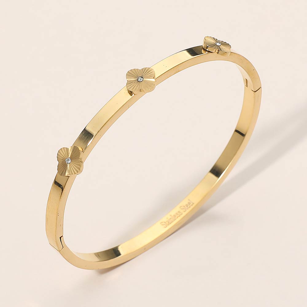 Madeline Love Gold Stainless Steel CZ Center Quatrefoil Station Hinged Bangle Bracelet - Bracelets
