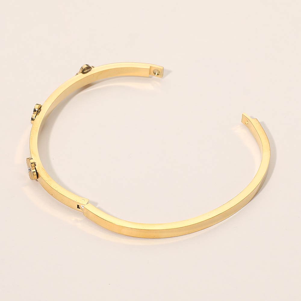 Madeline Love Gold Stainless Steel CZ Center Quatrefoil Station Hinged Bangle Bracelet - Bracelets - extra