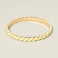 Madeline Love Gold, Yellow Enamel Inlay Twisted Hinged Bangle Bracelet - Bracelets