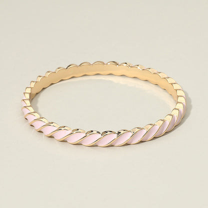 Madeline Love Gold, Light, Pink Enamel Inlay Twisted Hinged Bangle Bracelet - Bracelets