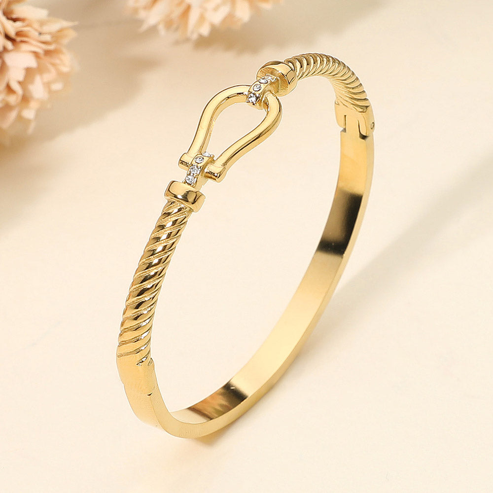Madeline Love Gold SECRET BOX_Stainless Steel Horsebit Buckle Accent Twisted Hinged Bangle Bracelet - Bracelets