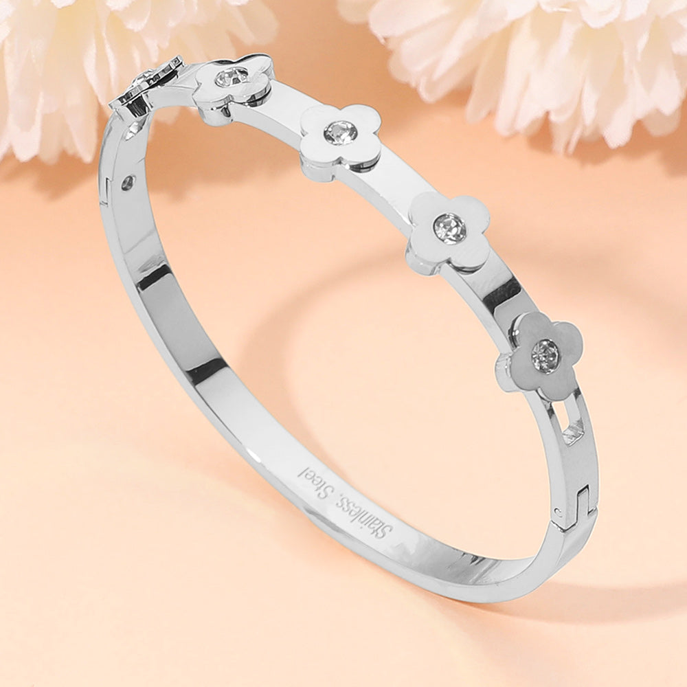 Madeline Love Silver Stainless Steel CZ Stone Accent Quatrefoil Motif Hinged Bangle Bracelet - Bracelets