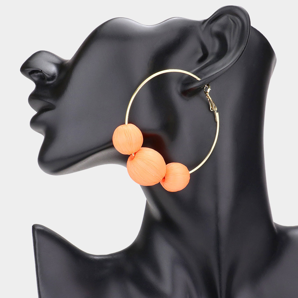 Madeline Love Orange Raffia Wrapped Triple Ball Hoop Earrings