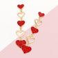 Gold Rhinestone Paved Heart Link Dropdown Earrings add a touch of glamour to any outfit. The rhinestones are carefully placed in a heart link design, giving these earrings a unique and luxurious look. Elevate your style with these stunning earrings.