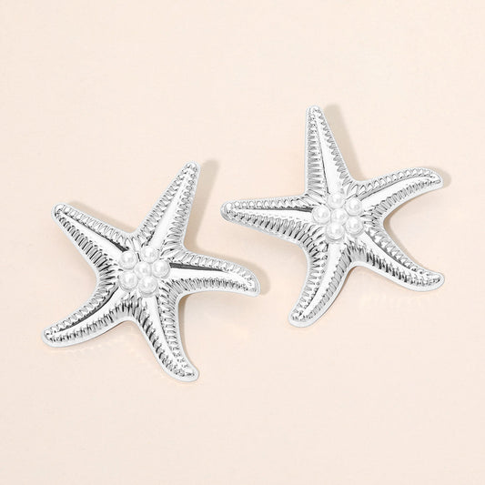 Madeline Love Rhodium Bold Pearl Center Textured Starfish Statement Earrings