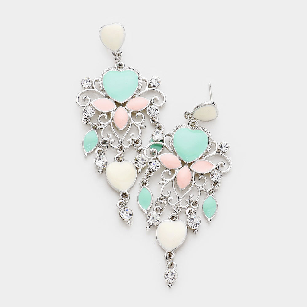 Multi Heart Chandelier Earrings are the perfect accessory for any formal occasion. Crafted from high-quality materials, they feature a delicate, intricate design that adds sophistication to any outfit. The unique heart shape makes a bold statement, elevating your look with elegance and charm.