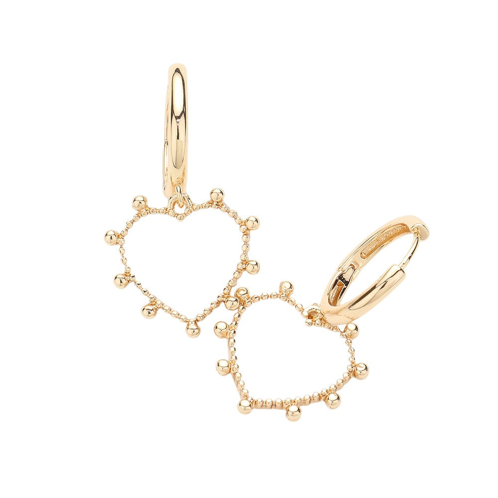 Enamel Heart Dangle Huggie Earrings add a touch of elegance to any outfit. The enamel hearts provide a pop of color, while the huggie design ensures a secure and comfortable fit. These earrings are a versatile and stylish addition to any jewelry collection, perfect for everyday wear or a special occasion. 