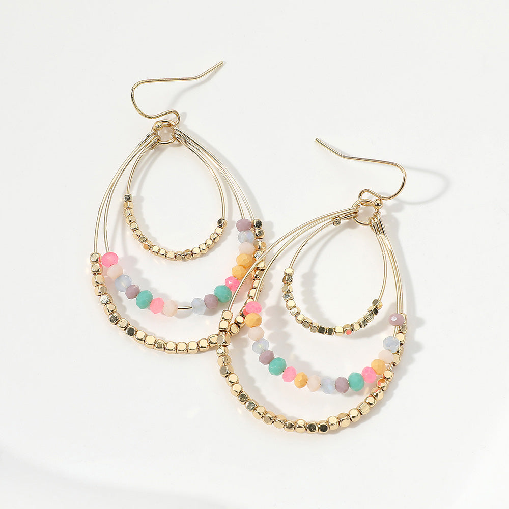 Madeline Love Gold, Multi Metal Ball Faceted Beaded Triple Wire Teardrop Layered Dangle Earrings