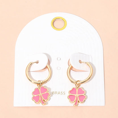 Madeline Love Gold, Hot Pink Clover Charm Drop Mini Huggie Hoop Earrings